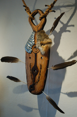 Drew Michael discusses his work, “Reaching Out,” at the First Friday opening of his show, “Spaces Within,” at Bunnell Street Arts Center.-Photo by Michael Armstrong, Homer News