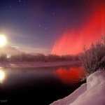 This photo of a moonrise with ice fog in the western Chugach Mountains shows the rare red northern lights.-Photo by Dave Parkhurst