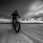 Kim McNett rides her fat bike on a Homer area trail.-Photo by Bjørn Olson
