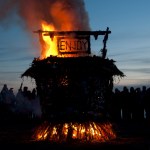 The 10th annual Burning Basket celebration glows bright against Sunday’s darkening sky.-Photo by Heather Ericson, special to the Homer News