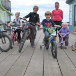 From left, Regan Baker, Reilly Sue Baker, Wyatt Vogl, Gryffyn Linder, Katlyn Vogl, Arwyn Linder and Rusty Baker keep busy on the Spit boardwalks near their parents’ businesses.-Miranda Weiss