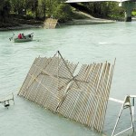 Alaska Department of Fish and Game fisheries biologist Larry Wheat counts red salmon recorded by a DIDSON camera from a perch inside a small cabin alongside the Kasilof River. The department is using the sonar to keep track of escapement goals.-Peninsula Clarion file photo