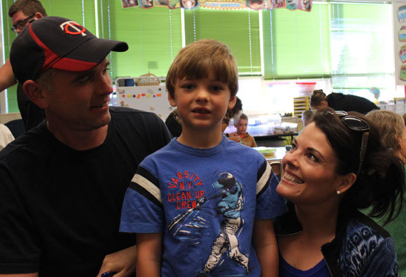 Aidan Cooney finds his place in kindergarten teacher Dina Marion’s Paul Banks classroom.