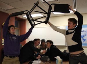 Members of Homer High Schools’ drama, debate and forensics team — Patrick Latimer, Robert Hockema, Lindsay Schneider, Evan Boyer and August Kilcher — playfully demonstrate their strong debate techniques.-Photo by McKibben Jackinsky, Homer News