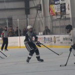 Mariners Clem Tillion, 17, and Anton Kuzmin, 8, battle against SoHi in Saturday’s final game of the End of the Road Shootout.-Photo by McKibben Jackinsky, Homer News