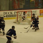 Mariners, from left,  Clem Tillion, Danny Wiest and Ulian Kuzmin try for a shot on goal in the Jan. 22 game against Kenai.-Photo by Tracey Tillion