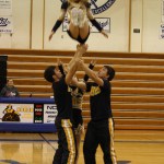 Raising a cheer for the Mariners at last week’s Meet-the-Mariners event are Josh Fisk, Kyah Doughty, Michael Swoboda and, in the air, Riley Walls.-Photo by Lindsay Olsen for the Homer News