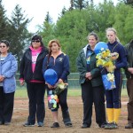 Honored at the Mariners’ Monday game are, from left, Shyanna Parr and her parents Bill and Victoria, Jordyn Haye and her mom Carrie, Hailey Hughes and her mom Robbie Coffey and dad Steve Hughes, and Brenna Evearts and her mom Fran. -Photo by McKibben Jackinsky, Homer News