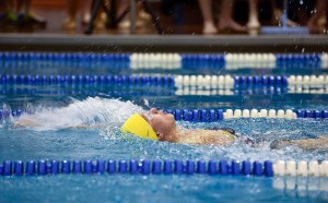 Homer’s Jenna Fabich swims during the 50-yard backstroke competition during SoHi’s Pentathalon in Soldotna on Friday.-Photo by Rashah McChesney, Peninsula Clarion