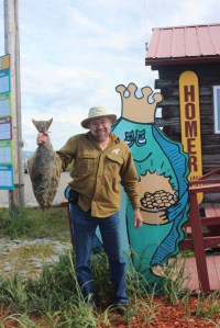 Randy Haines of Fort McDowell, Ariz., shows off the tagged halibut he caught in the Homer Jackpot Halibut Derby. The value of the tag will be announced Sept. 16.  -Photo provided