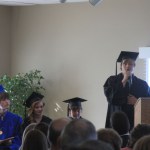 Benson Woodard Eldon addresses the audience at Homer Flex High School graduation Monday.-Photos by Shannon Reid