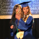 Maggie Koplin moves her tassel from right left.-Photo by McKibben Jackinsky, Homer News