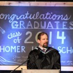 HHS Principal Doug Waclawski congratulates graduates.-Photo by McKibben Jackinsky, Homer News