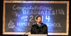 HHS Principal Doug Waclawski congratulates graduates.-Photo by McKibben Jackinsky, Homer News