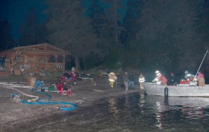 Firefighters arrive by boat to fight the fire.-Photo by Heather Ericson