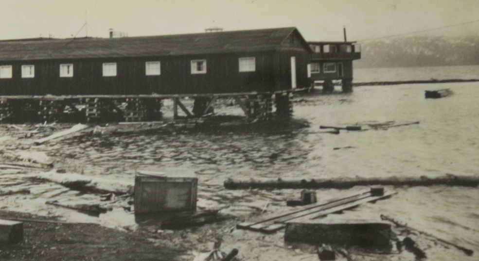 Copy of a photo showing Land’s End up on cribbing to keep it above the high tide following the 1964 earthquake. -Copied with permission of Jon Faulkner.