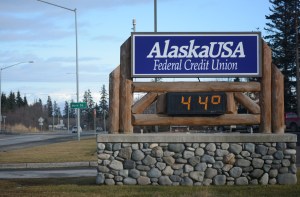 The time and temperature sign reads 44 degrees on Feb. 18 at Alaska USA Federal Credit Union on the Sterling Highway. The average temperature for that day is 31 degrees.-Photo by Michael Armstrong, Homer News