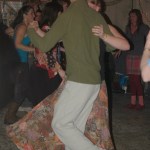New Year’s Eve revelers dance at a contra dance party at Renn Tolman’s boat shop last year.-Michael Armstrong