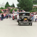 A Fourth of July parade in 2004 led by antique cars shows Seldovia’s timelessness.-Photo by Michael Armstrong, Homer News