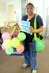 At 2 p.m. Saturday, the Homer Public Library clocked its 1-millionth visitor to the new library since it opened in September 2006. The lucky millionth visitor, Joy McCaul, was greeted with a certificate, goody bag and gift certificate provided by Friends of the Homer Public Library. Patrons and staff in the library enjoyed the look of surprise on McCaul’s face when they told her what was going on. The celebration included  balloons, carrot cake and noisemakers blown by the librarians.-Photo Provided