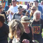 An enthusiastic crowd enjoys the music under sunny skies.-Photo by McKibben Jackinsky, Homer News