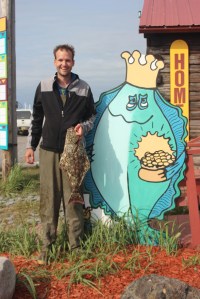 Brian Baker of Anchorage, caught this tagged halibut June 29 while fishing on a private boat.-Photo provided