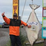 James Jell of Moscow, Idaho, moves into the lead of this year’s Homer Jackpot Halibut Derby with a 198.2-pound halibut he landed July 7 while fishing with Capt. Chad Kiesel of Silver Fox Charters aboard the Arctic Envy.-Photo provided