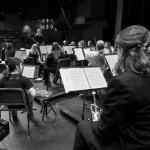 Artistic director Tammy Vollum-Matturro offers insight to musicians during a rehearsal for last Saturday’s Pops concert.-Photo by Sue Biggs