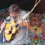 Larry Keel and Natural Bridge entertain on the Ocean Stage. -Photo by McKibben Jackinsky, Homer News