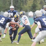Homer High School running back Connor Seay dodges through a pack of Soldotna High School blockers during the Sept. 21 game at Soldotna High School in Soldonta, Alaska. -Photo by Rashah McChesney, Morris News Service - Alaska