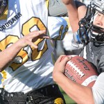 Voznesenka’s Kosta Reutov tries to take down Nikiski’s Michael Stangel during the Sept. 19 game in Nikiski.-Photo by Rashah McChesney, Morris News Service - Alaska