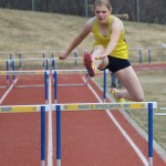 Homer’s Lauren Jones takes flight in the girls 300-meter, 30-inch hurdles. She placed fifth with a time of 56:32.-Photo by McKibben Jackinsky, Homer News