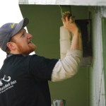 Steven Rainwater of Homer’s Church on the Rock paints during a Karen Hornaday Park cleanup.