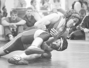 Kenai’s Matt Aho wrestles Homer’s Jaret Cole at 160-pounds during the Nikiski Duals on Saturday.-Photo by M. Scott Moon, Morris News Service - Alaska