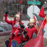 The Queen and King of Hearts, Catriona and Derek Reynolds, greet their subjects during Saturday’s parade.-Photo by McKibben Jackinsky, Homer News