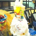 A bird costume made of recycled materials