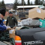 Eric Nelson, Jeff Wraley and Gary Smith of Total Reclaim in Anchorage collect electronic equipment dropped off for recycling by Tech Connect.-Photo by McKibben Jackinsky, Homer News