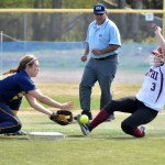 Ketchikan’s Felicia Ruaro, right, slides safely into second base as Homer’s Miranda Beach attempts to field the ball and make the tag during the small schools state softball tournament Friday, May 31 at Cartee Fields in Anchorage.-Photo by Mike Nesper/Morris News Service - Alaska