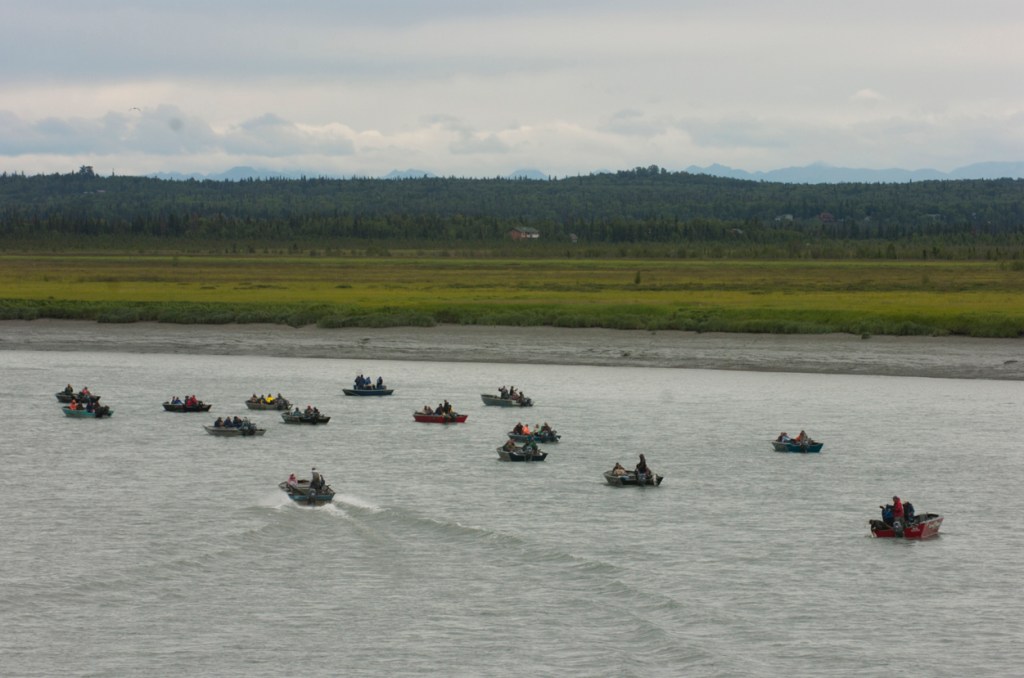 In this July 2006 photo, a crowded group of anglers work the Kenai River for king salmon near the Warren Ames Memorial Bridge in Kenai.-Peninsula Clarion file photo