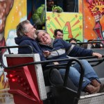 Ray Rodeheauer and Suzanne Lagasse of Soldotna get some laughs riding the Sizzler at the Kenai Peninsula Fair carnival on Saturday night.-Photo by McKibben Jackinsky, Homer News