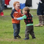 Hank Geragotelis of Homer and Kellen Isenhour of Anchor Point dance to the music of Homer Free at the Kenai Peninsula Fair on Saturday night.-Photo by McKibben Jackinsky; Homer News