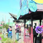 The sun shines on cruise ship passengers, shoppers, fishermen and kids enjoying activities on the Homer Spit on Labor Day, for many the unofficial close to a great summer season.-Photo by Michael Armstrong, Homer News
