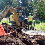 Workers with United Technologies Inc. work on a distribution line on Bayview Avenue on Tuesday. -Photo by Michael Armstrong, Homer News