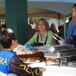 First Lady Sandy Parnell, left, and Gov. Sean Parnell, right, serve food to Thomas and Joanne Munger during the Governor’s Family Picnic at Karen Hornaday Park. -Photo by Michael Armstrong, Homer News