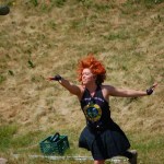 Katie Jo Brock of Homer tosses the Braemar stone.-Photo by Michael Armstrong, Homer News
