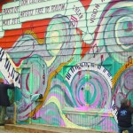 Visitors decorate Mary Epperson’s Etude Studio for a celebration honoring her in 2014. Judy Wynn and Jennifer and Laura Norton painted the building.-Photo by Michael Armstrong, Homer News