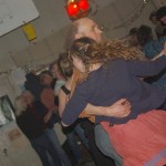 Couples swing their partners at Renn Tolman’s New Year’s Eve contra dance. -Michael Armstrong