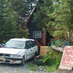 Demian Sagerser’s house off the Sterling Highway near Stariski Creek is where Demarqus Green shot and killed Sagerser on July 7, 2012. A game camera in the woods to the right in the photo caught Green entering and leaving the house.-Photo by Michael Armstrong, Homer News