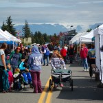 Visitors stroll down Hazel Avenue for the Homer Council on the Arts Street Faire.-Photo by Michael Armstrong, Homer News