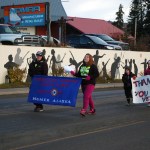 Members of the American Legion Post 16 Junior Auxiliary walk in the Veterans Day parade on Pioneer Avenue on Monday. Marching are Jen Paulant, Amber Gilbreth, Bradley Paulant, Megan Hawe, and Sierra Hagett.